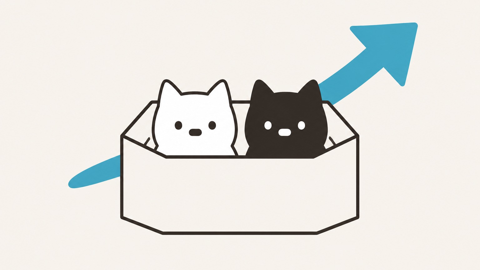 箱から顔を出す2匹のねこ